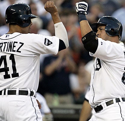 Victor Martinez and Jhonny Peralta chip in offensively for the Tigers, who crush Mariners rookie Michael Pineda.  (AP)