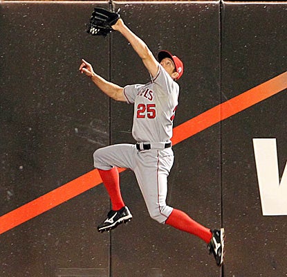 Peter Bourjos makes a leaping catch in the sixth inning to rob New York's  Ronny Paulino.  (US Presswire)