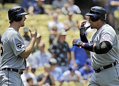 Miguel Cabrera (right) celebrates his two-run shot with teammate Brennan Boesch. (AP)