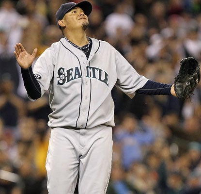Felix Hernandez feels just at home Friday night because he is at home. He strikes out 10 while earning the win for Seattle.  (Getty Images)