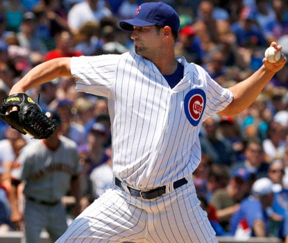 Cubs starter Doug Davis surrenders 10 runs and 12 hits in just 4 1/3 innings (AP)