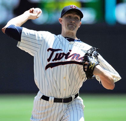 The Dodgers struggle to do anything against Scott Baker, who strikes out nine and allows no runs.  (Getty Images)