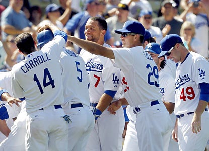 Juan Uribe (5) represents the winning run after the Dodgers end the Padres' combined no-hit bid with two outs in the ninth. (AP)