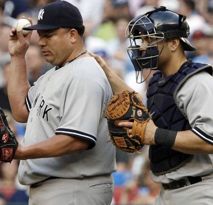 Bartolo Colon can only get two outs in the first inning before everything falls apart as the Blue Jays score eight runs.  (Getty Images)