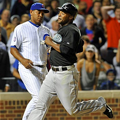 Marlins pinch-runner Dewanye Wise scores after Cubs closer Carlos Marmol blows his seventh save of the season. (Getty Images)
