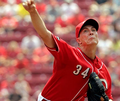 Homer Bailey gives up three hits in 7 1/3 innings for the Reds, who take two of three from St. Louis (AP)