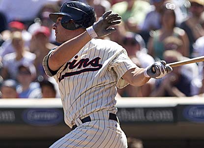 Danny Valencia hits the game winner for the second straight day to give the Twins a split of the four-game series. (US Presswire)
