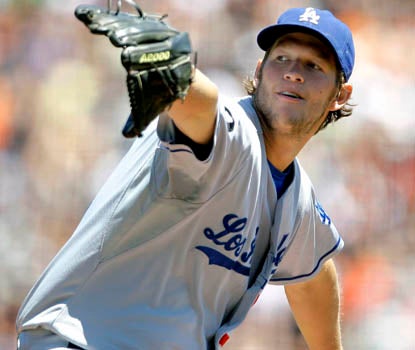 L.A.'s Clayton Kershaw outduels Tim Lincecum of the Giants, striking out 12 while allowing just three hits in eight innings. (AP)
