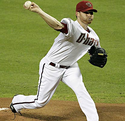 D-backs pitcher Ian Kennedy pitches seven scoreless innings to record his 11th victory of the season. (AP)