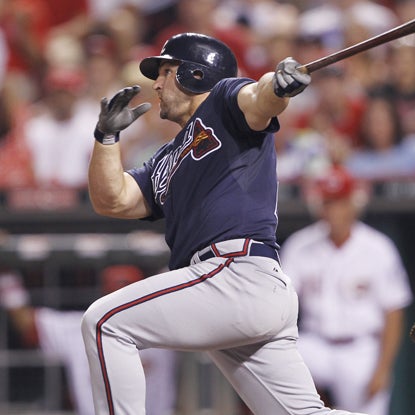 Braves' Dan Uggla powers through his 18th HR of the season -- his first ever as a pinch hitter. (Getty Images)