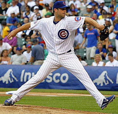 Randy Wells throws six effective innings for the Cubs to record his first win since April 4. (AP)