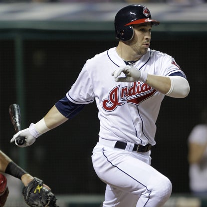 With two outs and the bases loaded in the bottom of the ninth, Jason Kipnis delivers his first career hit.  (AP)