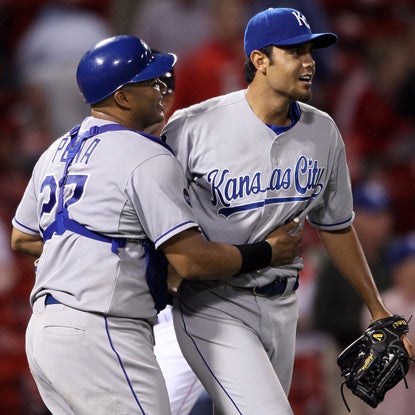 Joakim Soria (right) strikes out three in the bottom of the 14th to earn his 18th save of the season. (Getty Images)