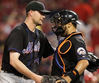 Mike Pelfrey accepts congratulations after his second complete game of the season, allowing just seven hits. (Getty Images)