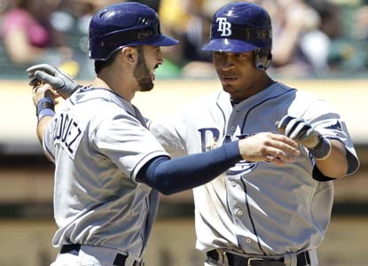 Along with his first career HR, Desmond Jennings has a two-run double in a seven-run seventh to help stun the A's. (AP)