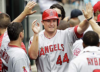 Rookie Mark Trumbo, who comes up a single shy of the cycle, draws praise after driving in a career-high five runs.  (AP)