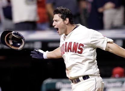 Cleveland's Matt LaPorta celebrates while rounding the bases after his three-run walk-off homer defeats Kansas City. (AP)