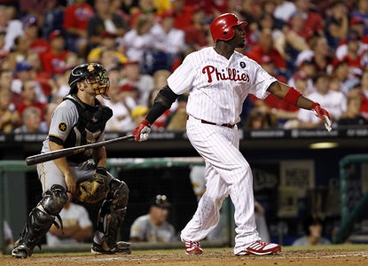 Ryan Howard powers through a HR in the second inning before finishing with four hits and three RBI.  (Getty Images)