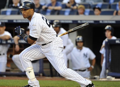 Robinson Cano goes 5 for 5 with five RBI while helping lead the Yanks to a 14-run victory over the Orioles.  (Getty Images)