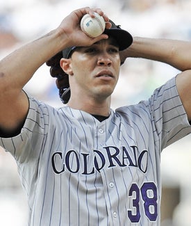 In a strange series of events, Ubaldo Jimenez gets traded to the Indians after hurling one last inning in a Rockies uniform. (Getty Images)