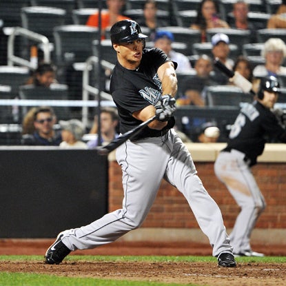 Mike Stanton takes a pitch from the Mets' Jason Isringhausen for a 'grand' ride in the 10th inning. (Getty Images)