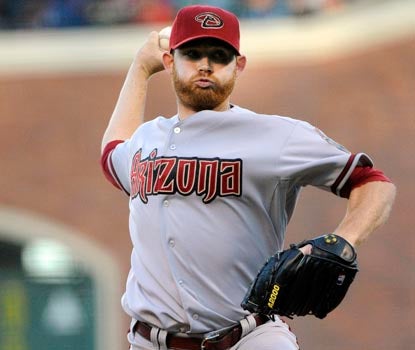 Ian Kennedy wins his 13th game of the season, tying Clayton Kershaw and Roy Halladay for the NL lead in wins. (Getty Images)