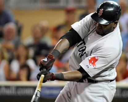 David Ortiz connects on a ninth-inning single for his fourth hit of the game, putting Boston up for good against Minnesota. (Getty Images)