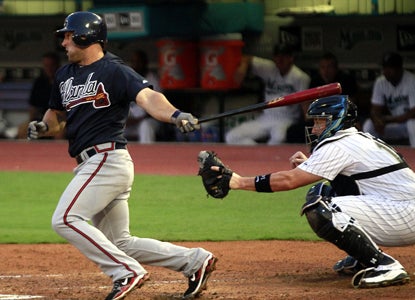 Despite hitting .220 on the season, Dan Uggla ups his MLB-best hitting streak to 29 games.  (Getty Images)