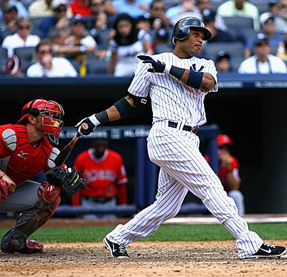 Facing the Angels' Scott Downs, Robinson Cano cracks his fifth career grand slam as the Yankees hold on to win. (Getty Images)