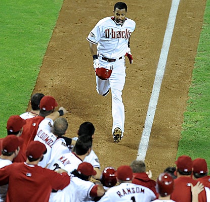 Chris Young's game-winning three-run shot helps the D-Backs pad their lead in the NL West. (Getty Images)