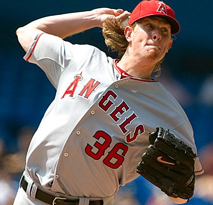 Angels ace Jered Weaver gets roughed up in Toronto, allowing eight runs and eight hits in his shortest outing of the year. (AP)
