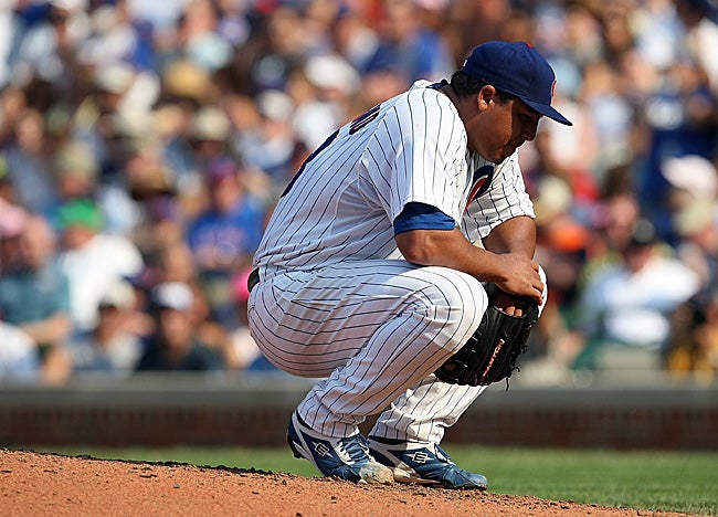 Cubs starter Carlos Zambrano is on the disqualified list after he left Friday's game in Atlanta. (Getty Images)