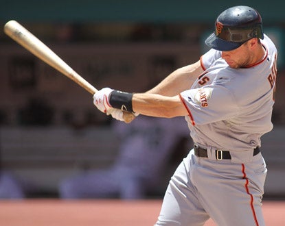 Brandon Belt makes the most of his promotion to the big leagues, connecting for two home runs against the Marlins. (Getty Images)