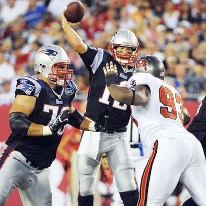 After sitting out New England's preseason opener, Tom Brady throws for 118 yards and two TDs against Tampa Bay. (Getty Images)