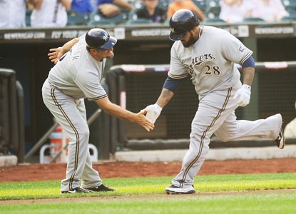 Prince Fielder (right) chalks up two hits, one home run and four RBI against the Mets. (Getty Images)
