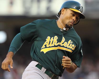 A's outfielder Coco Crisp rounds the bases after the first of his two home runs at Yankee Stadium. (Getty Images)
