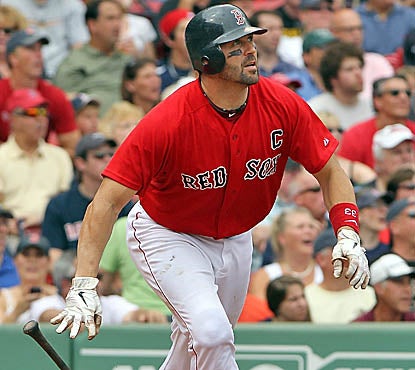 Jason Varitek watches his two-run homer off A's starter Guillermo Moscoso clear the fence in the second inning. (Getty Images)
