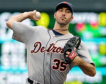 Justin Verlander gives up home runs to Luke Hughes and Jason Repko, but Detroit's ace still picks up his 20th win. (AP)