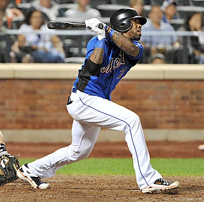 In his return from the DL, Jose Reyes singles in the seventh inning and eventually scores the Mets' fourth run.  (Getty Images)