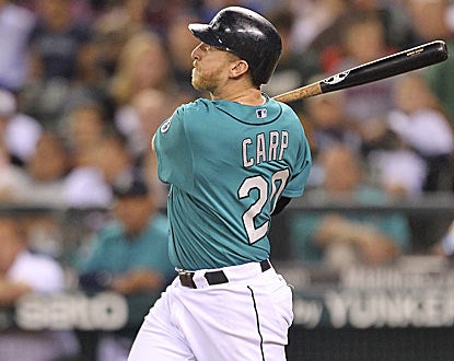 Mike Carp's eighth-inning home run gives him 22 RBI in August, just three shy of the club record for a month. (Getty Images)