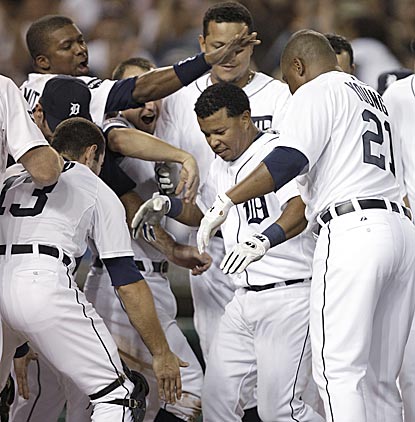 Light-hitting Ramon Santiago (24 HRs in 10 big-league seasons) is the unlikely hero for the first-place Tigers.  (AP)
