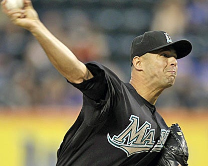 Javier Vazquez becomes the 30th major league pitcher to reach 2,500 career strikeouts. He retires 13 in a row against the Mets. (AP)