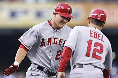 Mike Trout, whom the Angels drafted in the first round in 2009, heads for home after clouting his first home run.  (AP)