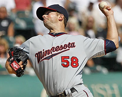 Scott Diamond earns his first big-league victory for the Twins, allowing three runs and three hits in six innings. (AP)