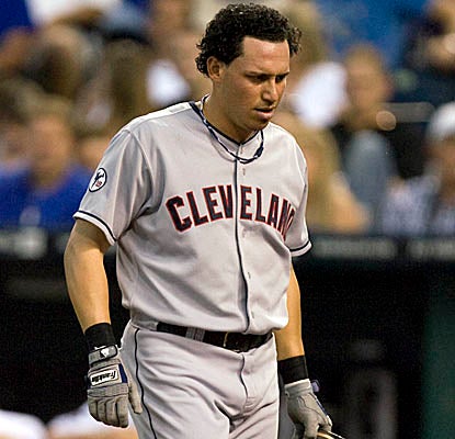 Asdrubal Cabrera walks it off after fouling a pitch off his left knee, just before homering for the Indians. (Getty Images)