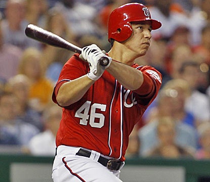 Making his major league debut, Nationals pitcher Tom Milone smacks a three-run homer in his first-ever plate appearance. (AP)