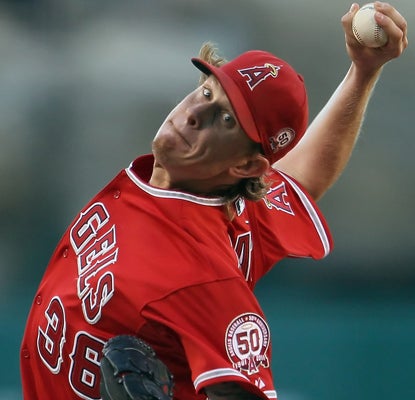 Jered Weaver strikes out eight Twins as he picks up his 16th win of the season. (Getty Images)