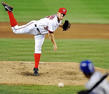Stephen Strasburg throws 40 of his 56 pitches for strikes, and whiffs four Dodgers in five innings of shutout ball. (AP)