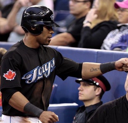 Edwin Encarnacion goes 2 for 4 with five RBI, including a tiebreaking double in the eighth inning, against the Red Sox.  (Getty Images)
