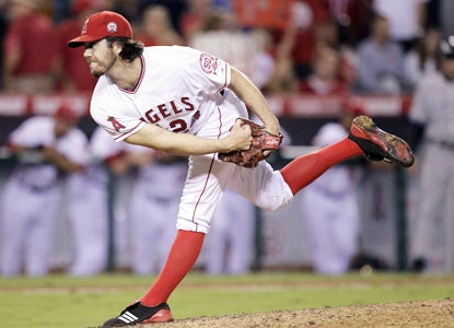 Dan Haren retires 18 straight while going the distance for the 15th time in 253 career starts.  (Getty Images)